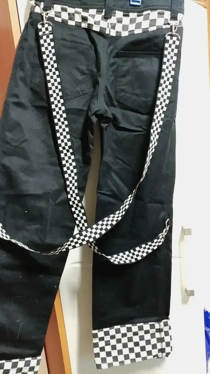 Goth-punk check bondage pants