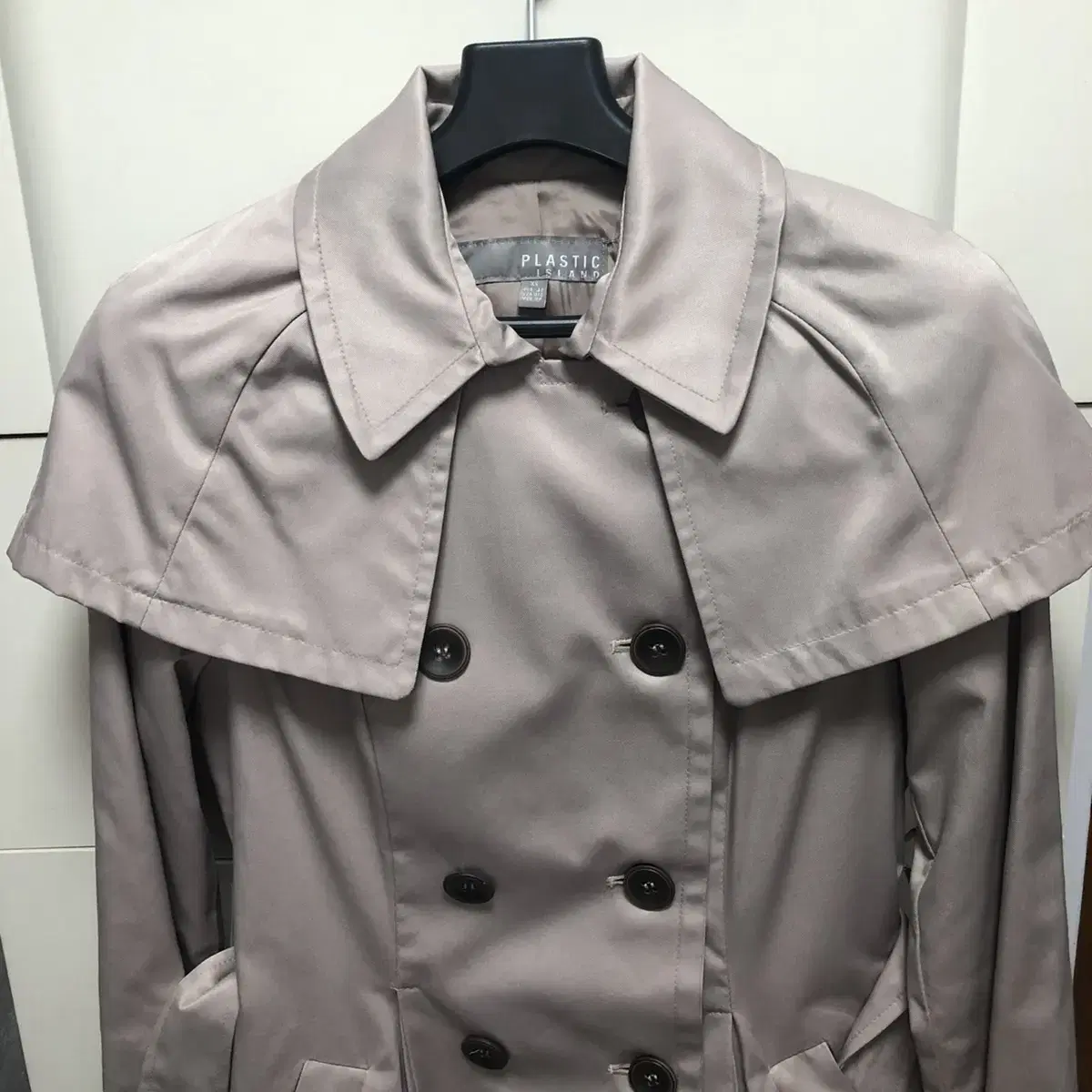 Plastic Island trench coat