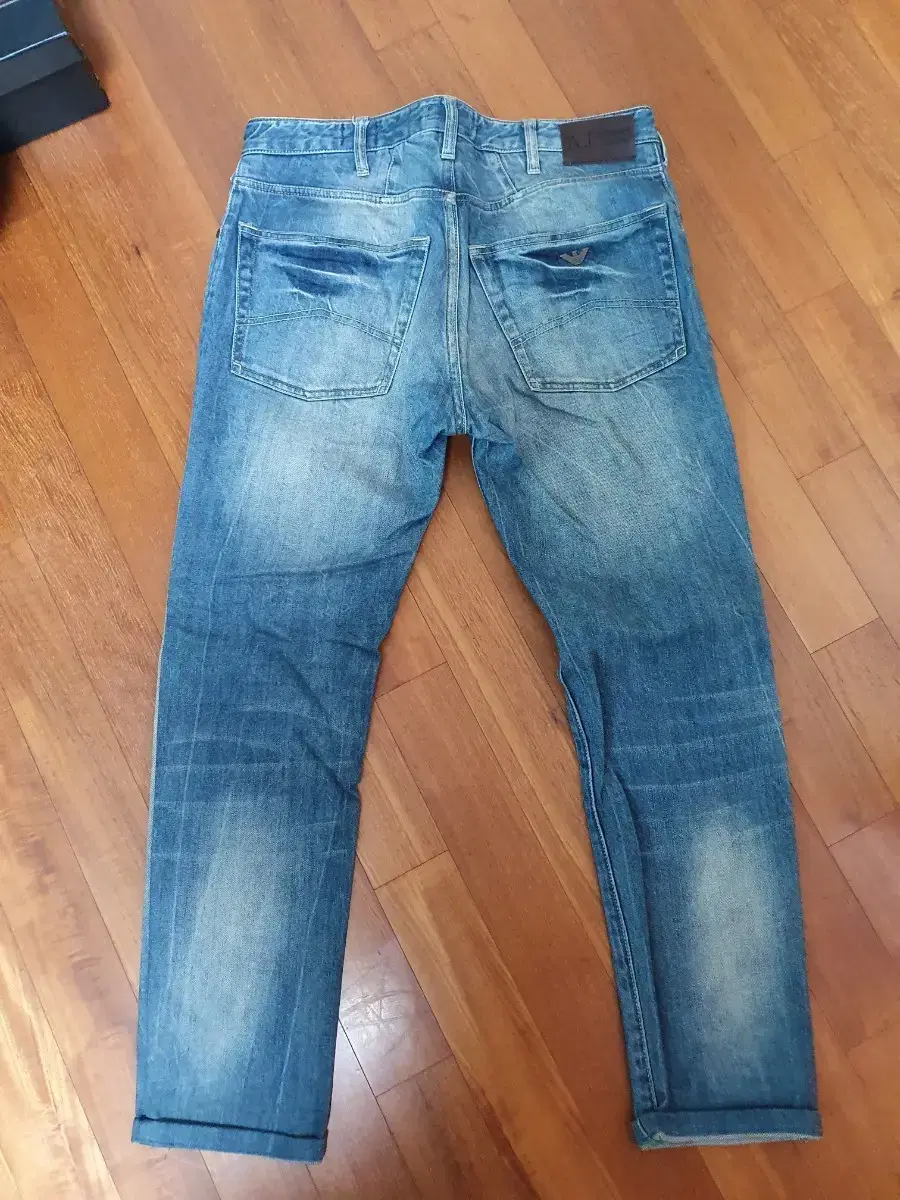 32 Genuine Almani jeans for sale.