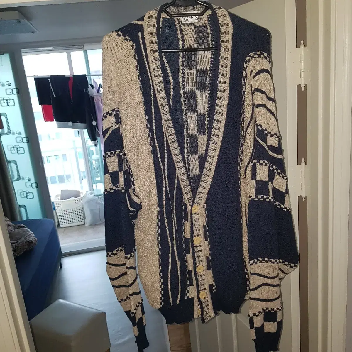 Kuzimat Overfit Cardigan sells