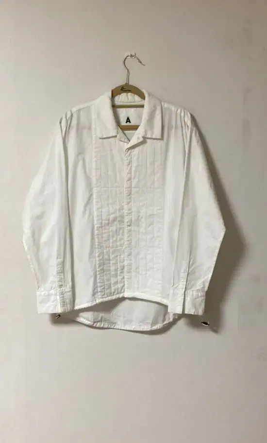 A white jacket-like shirt