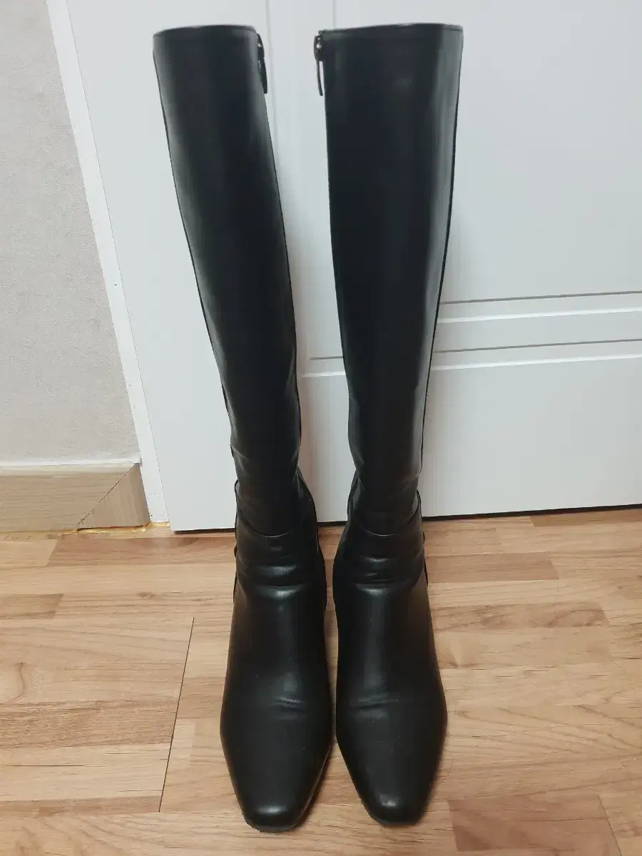 Black long boots (with fancy cushioned heirloom soles that you paid good money for)