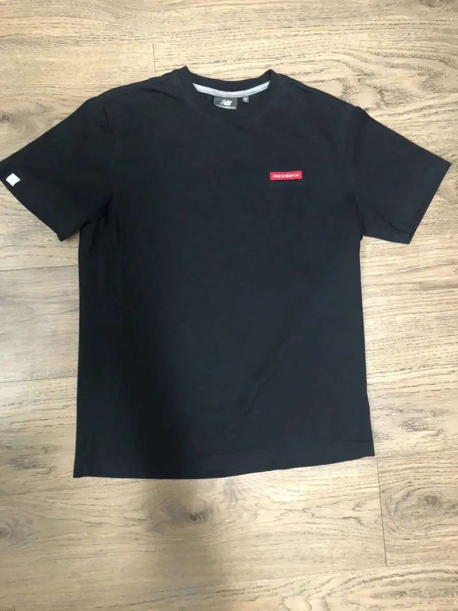 New Balance Black Vahn Short Sleeve Tee sells