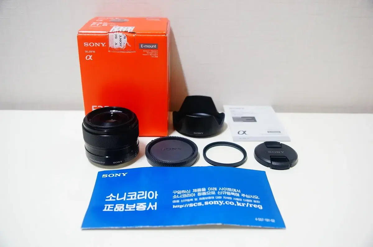 [소니] 카페렌즈 SEL 35mm f1.8 단렌즈 팝니다.(32만원)