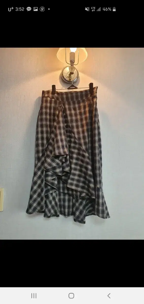 Unbalanced check long skirt