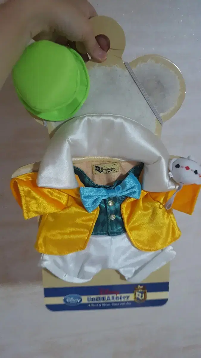 Brand new, authentic Disney Unibear alice hatmaker costume for sale.