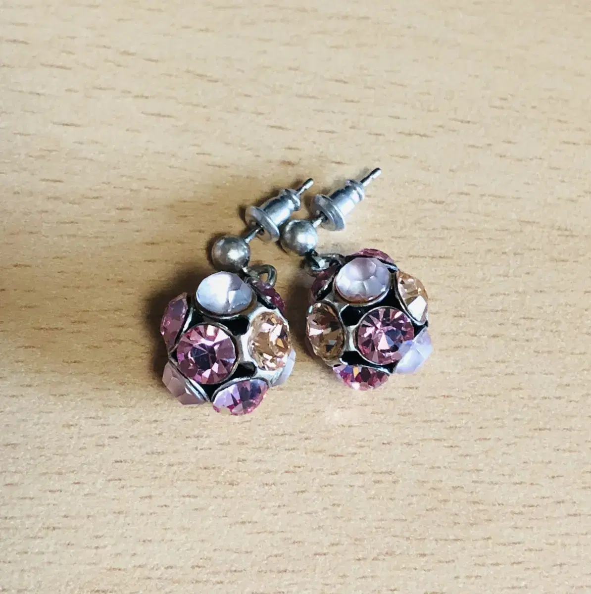 Pink mirror ball earrings that you can wear in your ears! They're round and cute~ Almost new