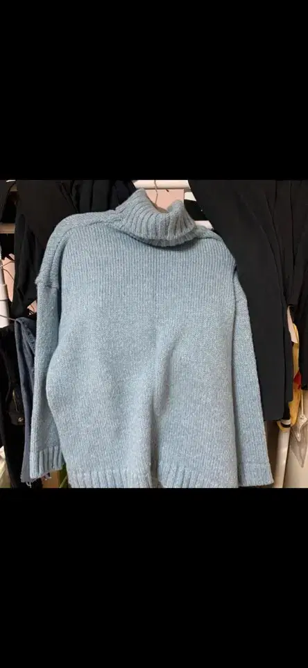 I'm selling a sora-colored turtleneck knit