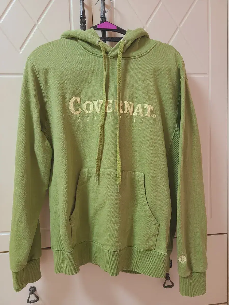 I'm selling a CoverNet hoodie in size S (avocado color)