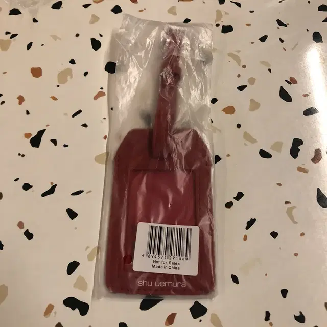 shu uemura luggage tag