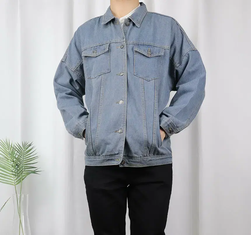 We are selling an overfit denim stitched denim jacket.