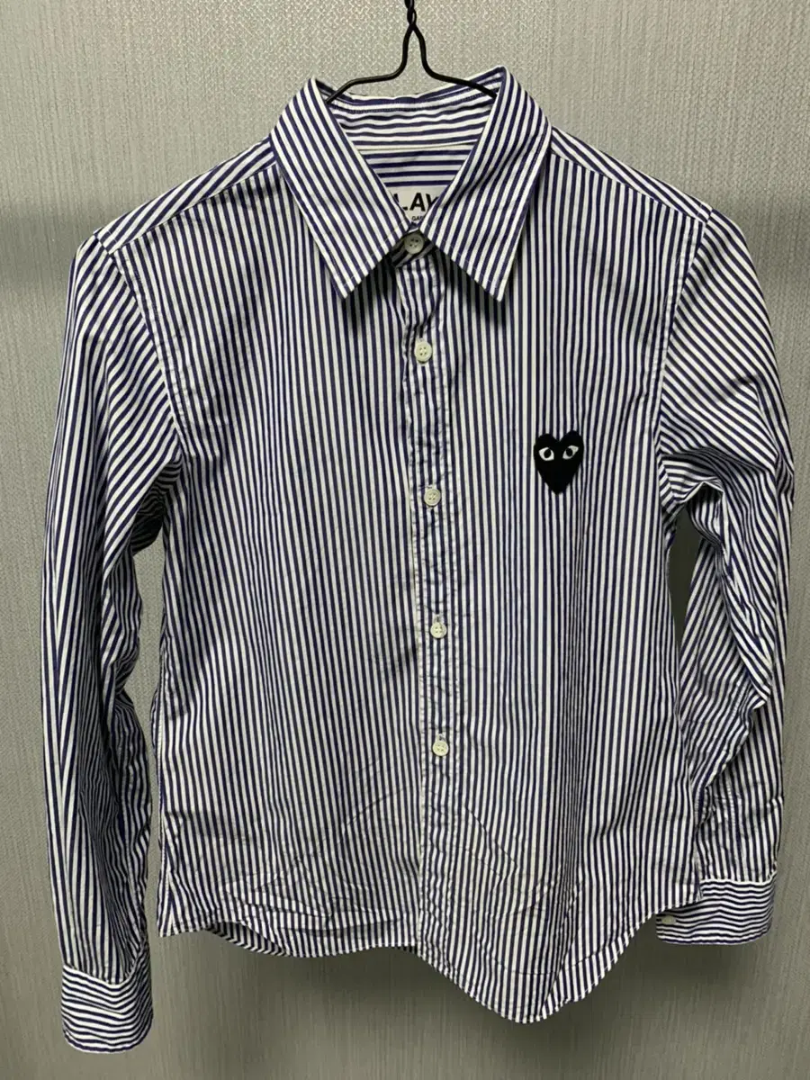 Sell genuine Comme des Garçons shirts.