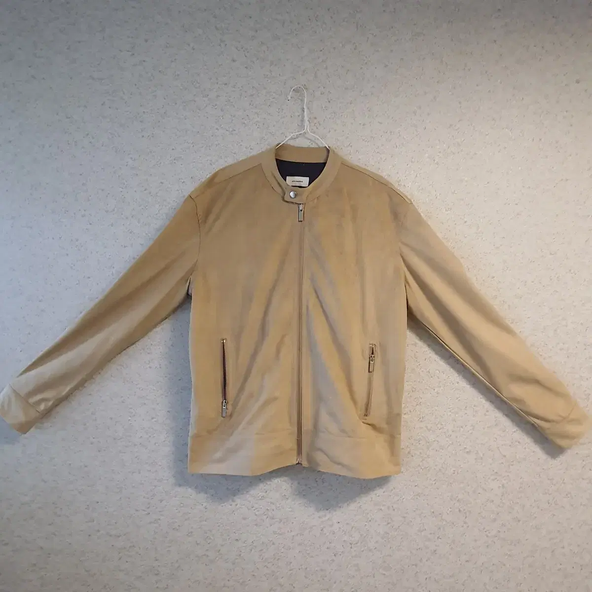 It's a large beige bloo jacket!