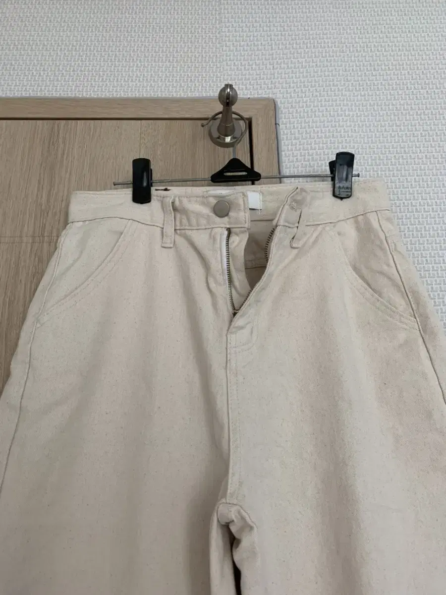 Cream wide-legged pants