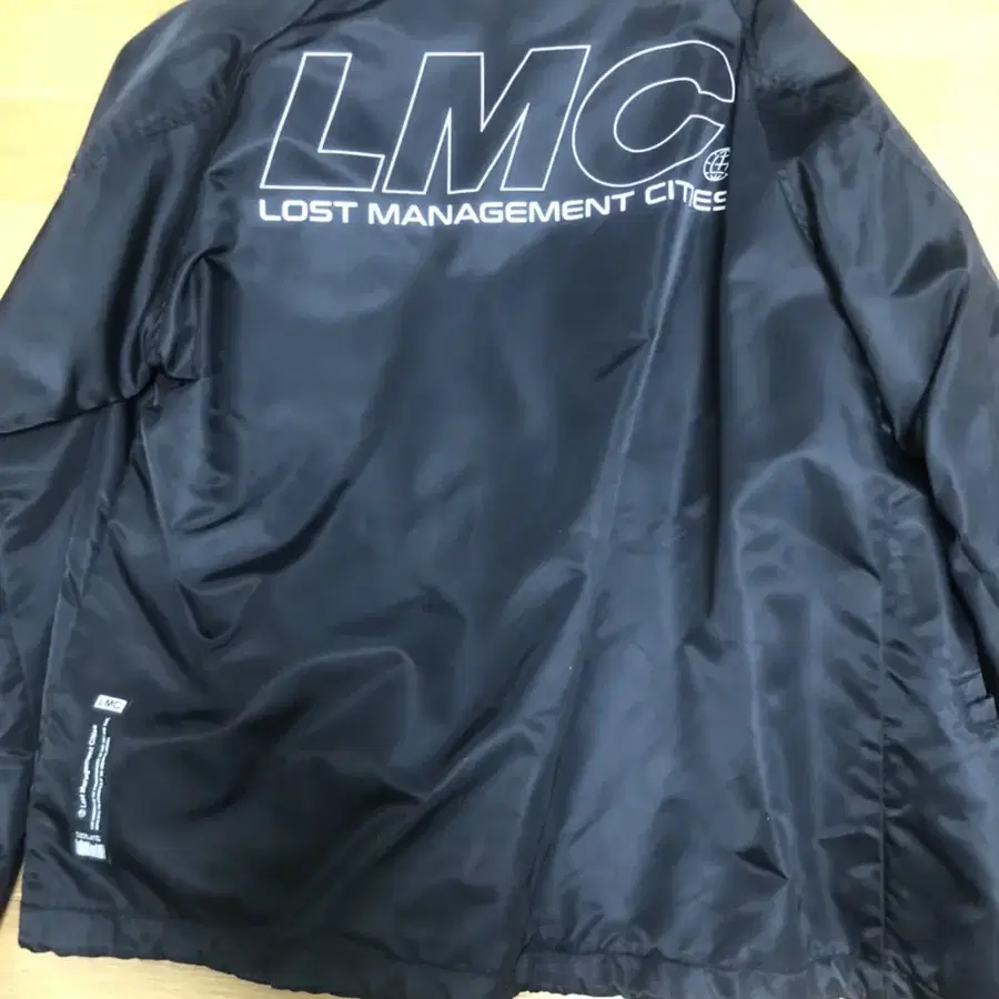 LMC바람막이 원가 99000원