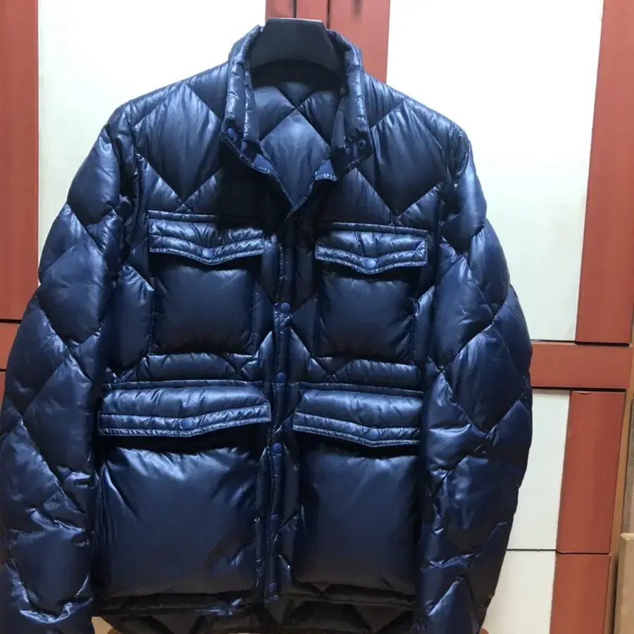 undercover assemble down jacket