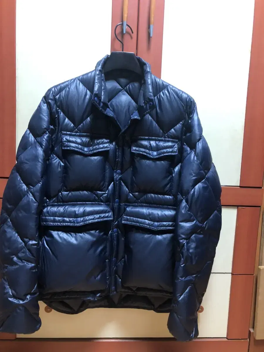 undercover assemble down jacket