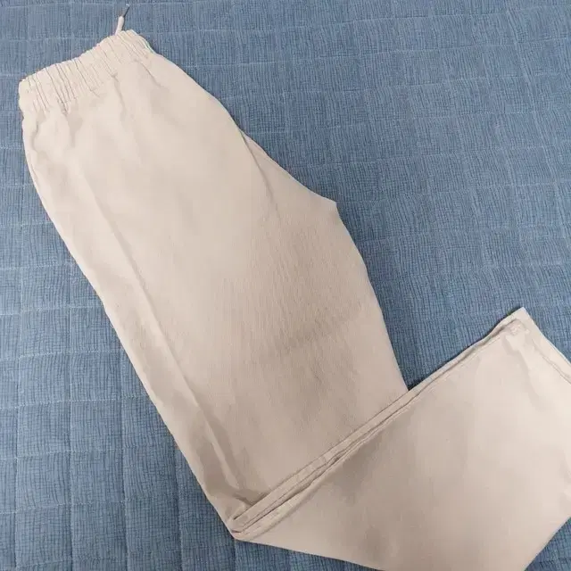 Men's beige cotton pants with elastic waistband