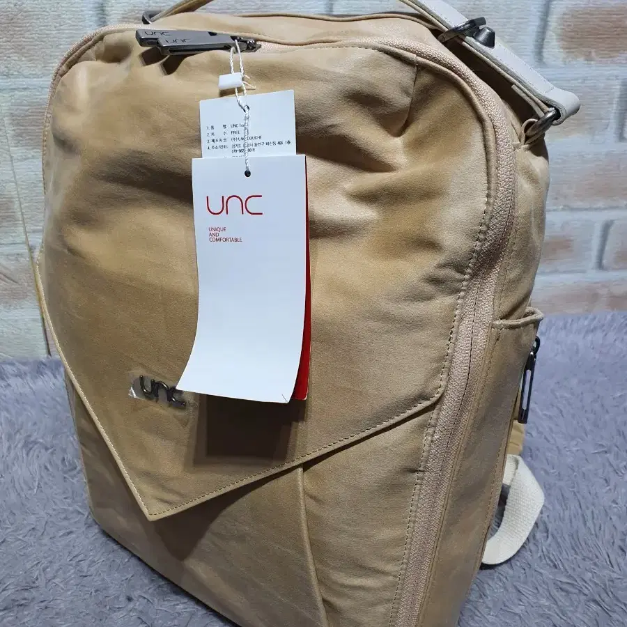 택부착 새상품 UNC 168,000원 백팩