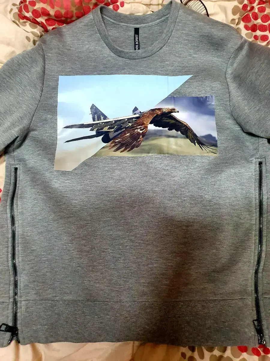 We sell Neil Barrett's Eagle Fighter gray sweatshirt.