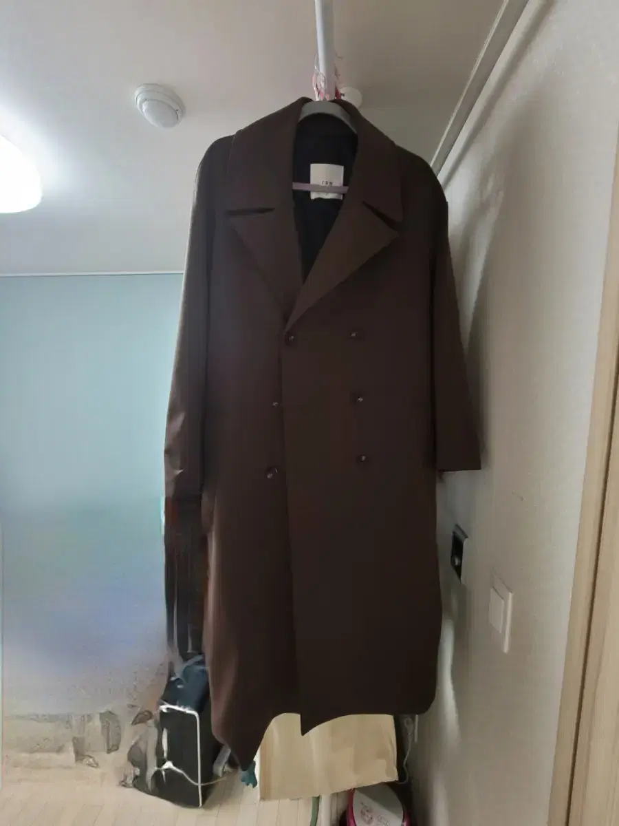 Brown trench coat