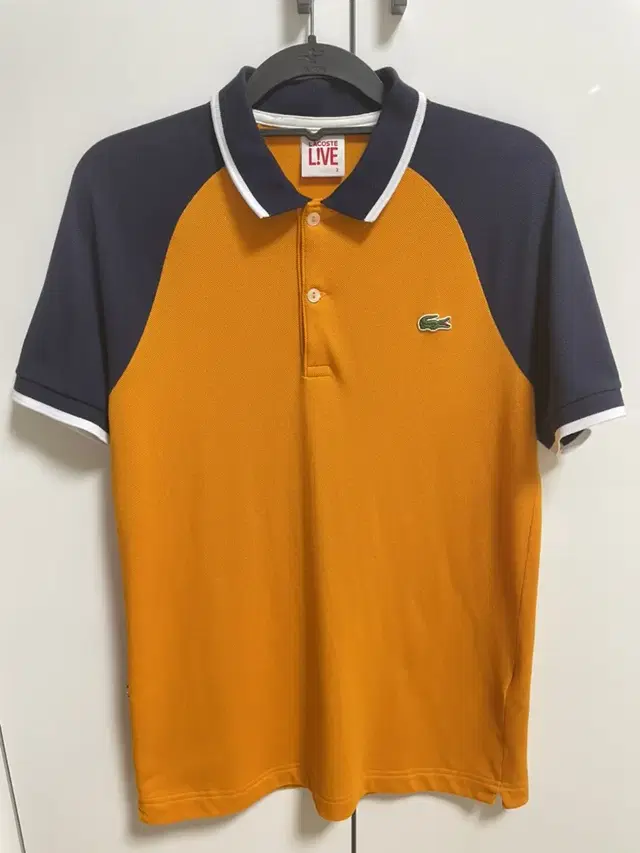 라코스테(LACOSTE) PK반팔티셔츠(오렌지)