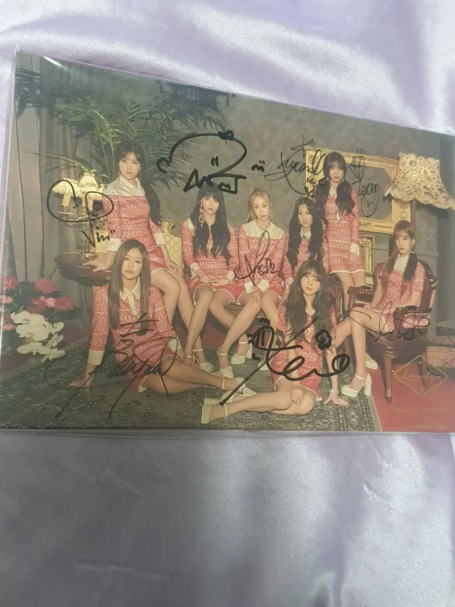 Lovelyz autographed album.