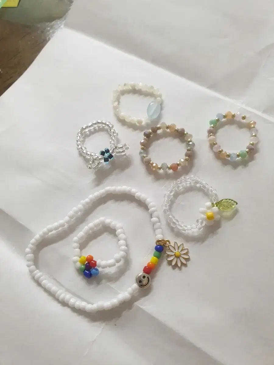 Beaded bracelets, rings