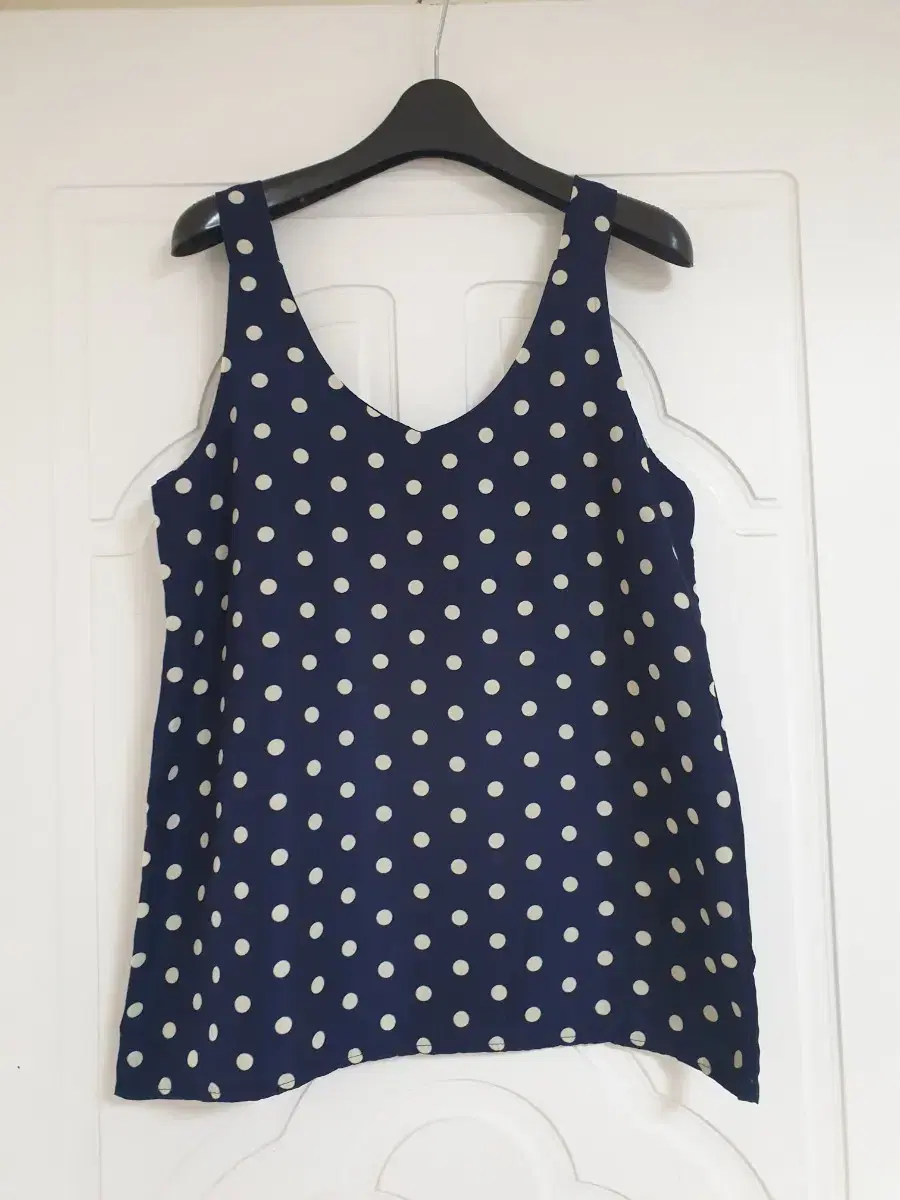 Navy polka dot nash blouse