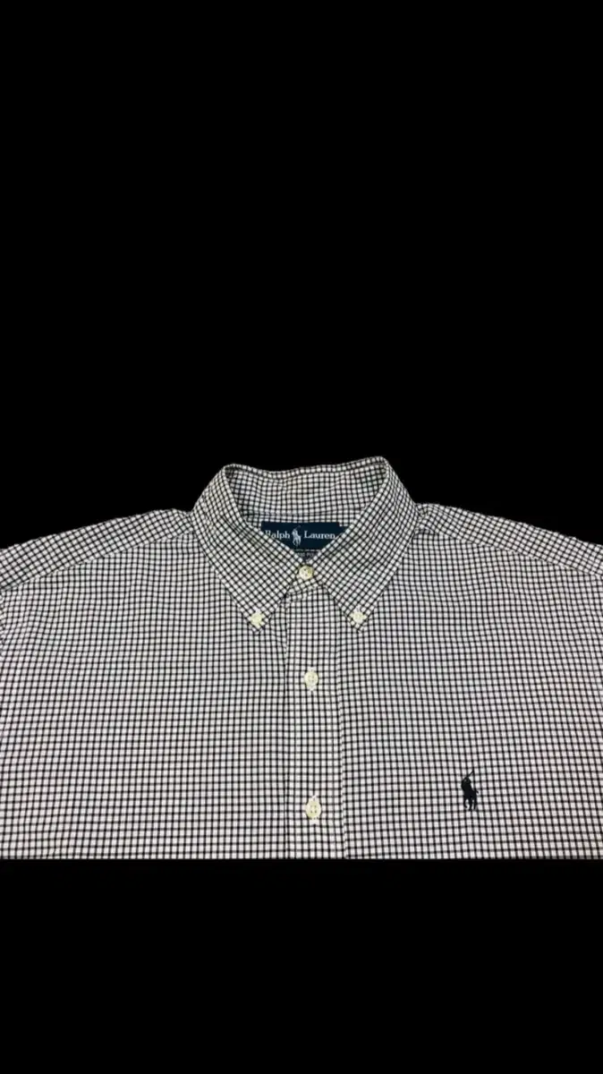 Polo shirt with a check pattern