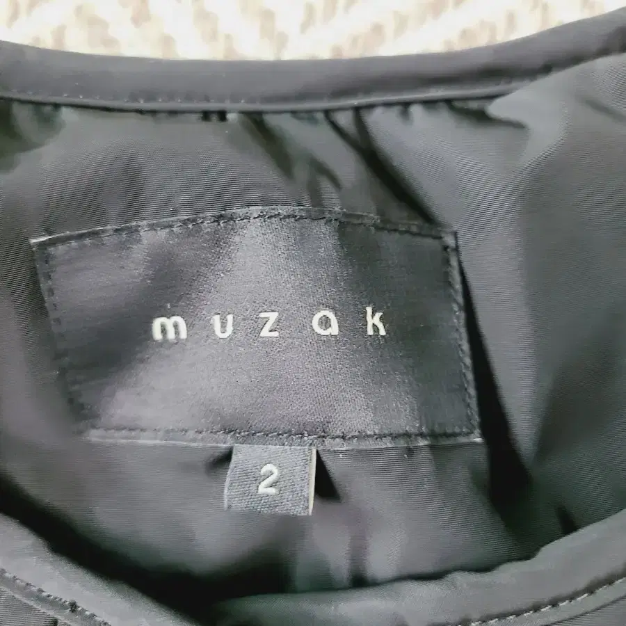 무자크 muzak 패딩재킷