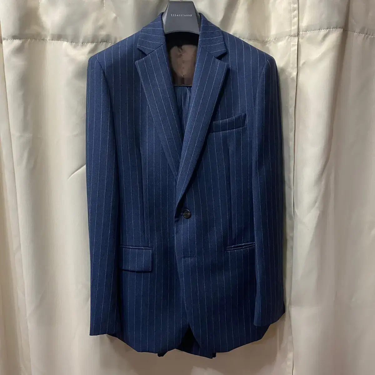 Riverclash Striped Suit (Navy) sells.