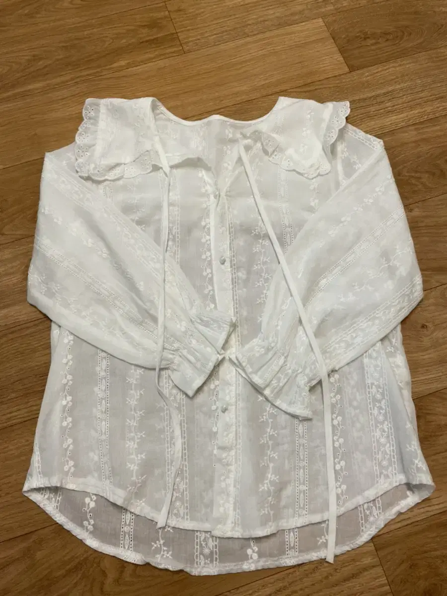 Plastic Island Punching Blouse