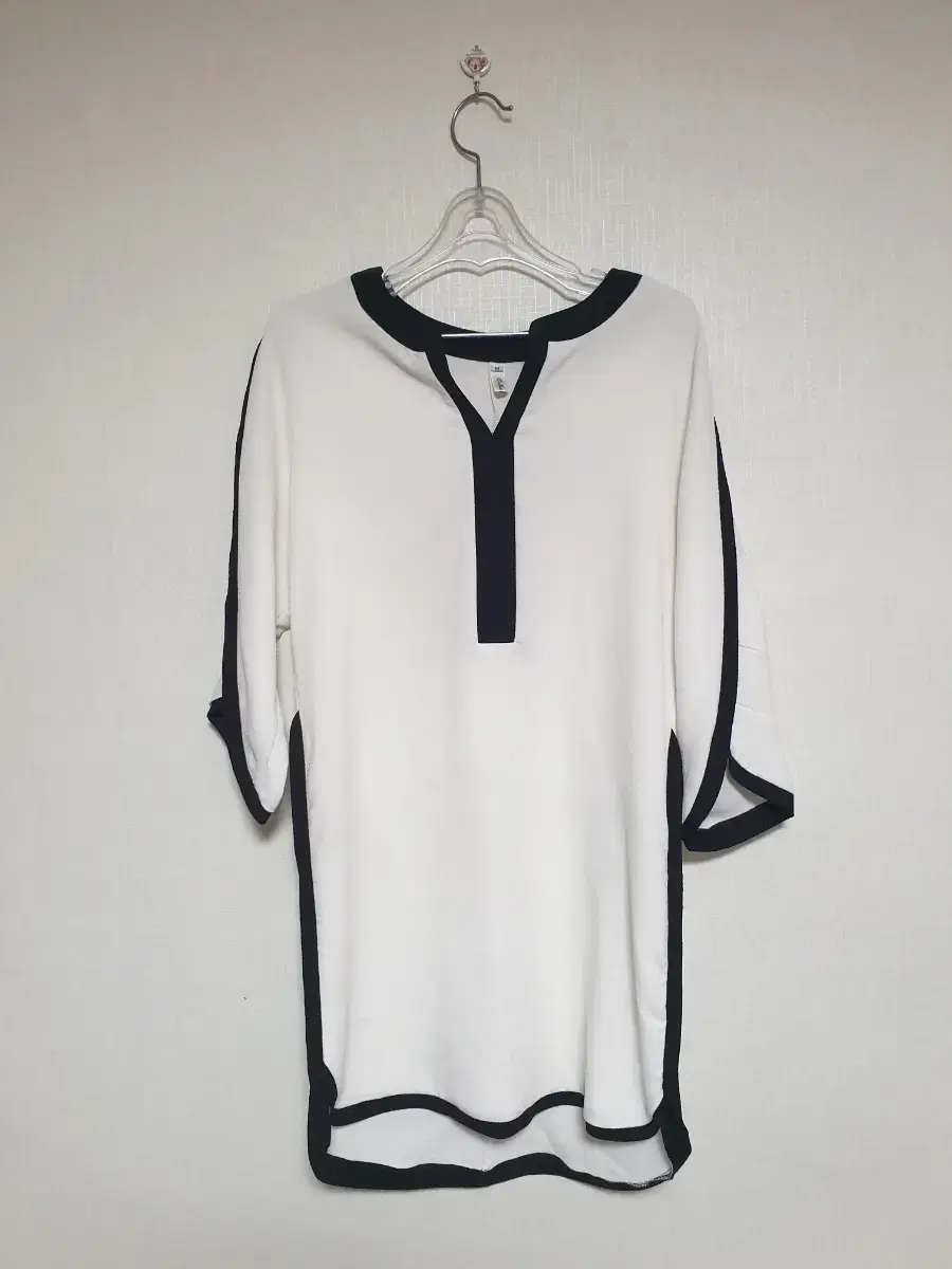 Unused 7-piece span blouse M