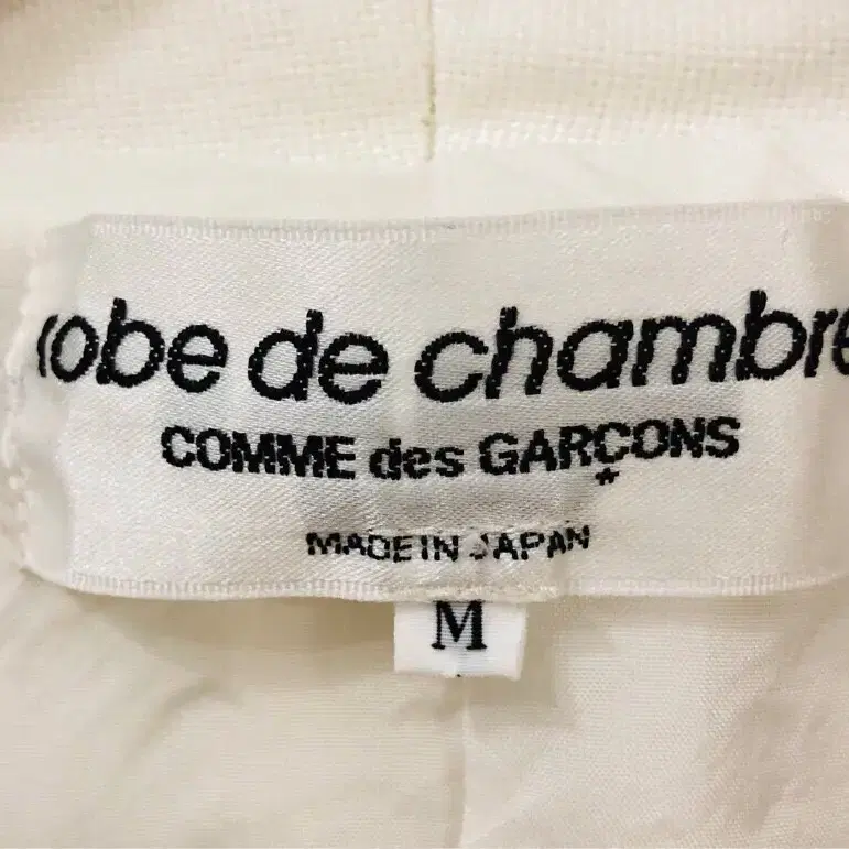 Comme des Garcons (robe de chambre)