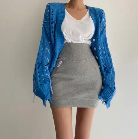 Manatee knit cardigan and miniskirt set