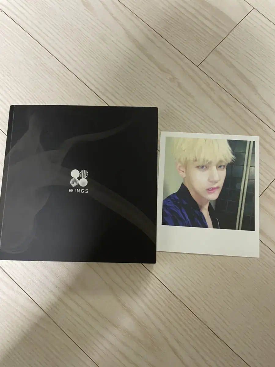 album, including Wings Taehyung photocard, sold