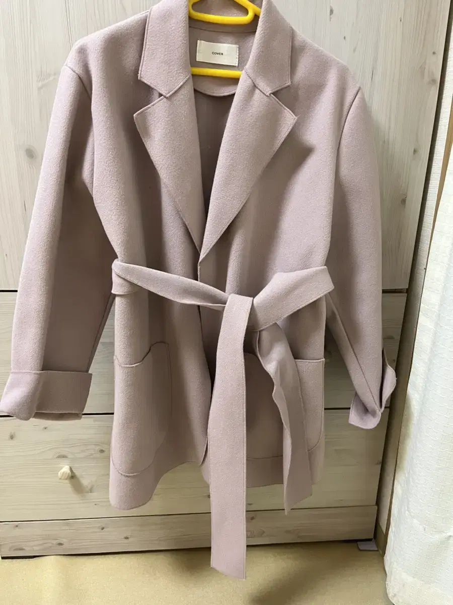 Light pink pocketed jacket coat