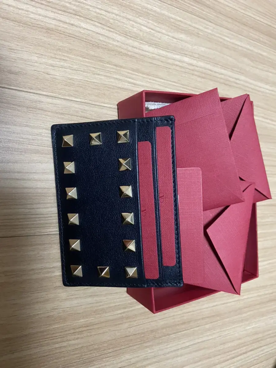 We are selling new Valentino kard wallets.