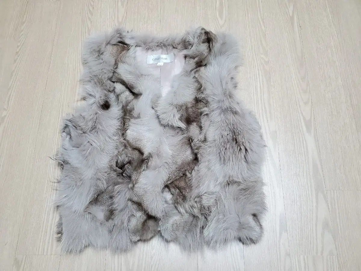 Fur vest size 55