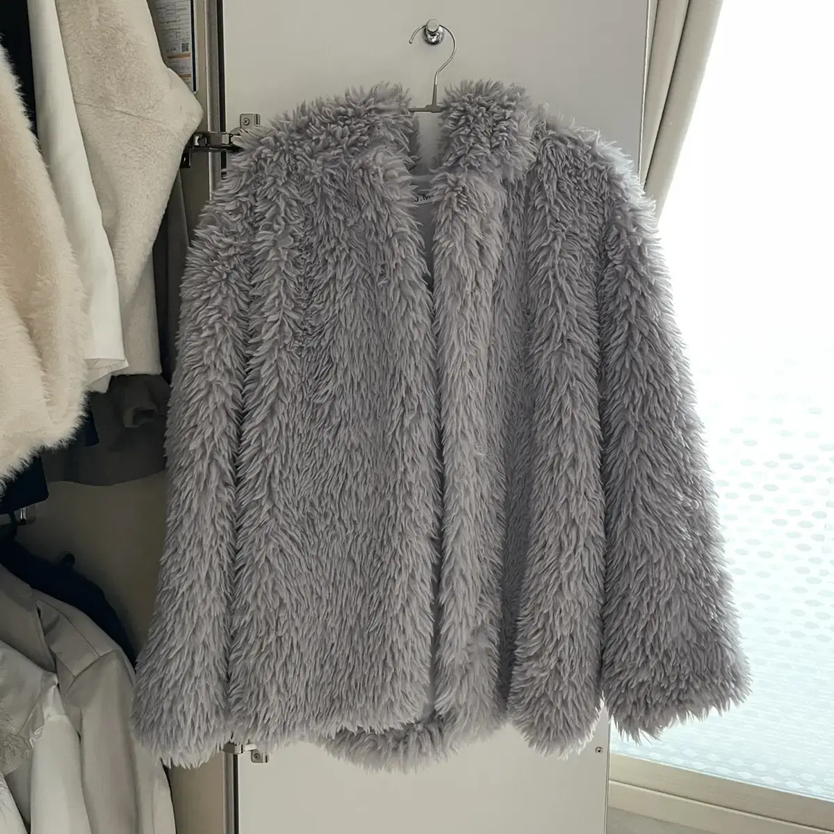 Hooded fake fur jacket