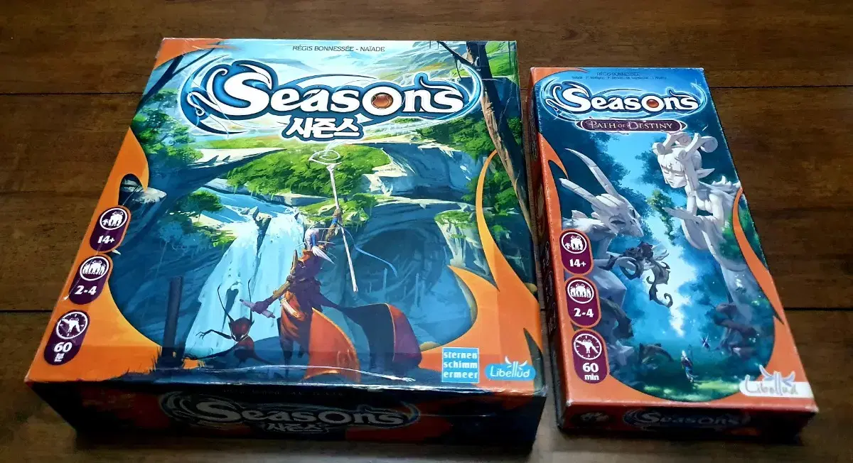 I'm selling 2 copies of the board game Seasons + Expanded Path of Destiny.