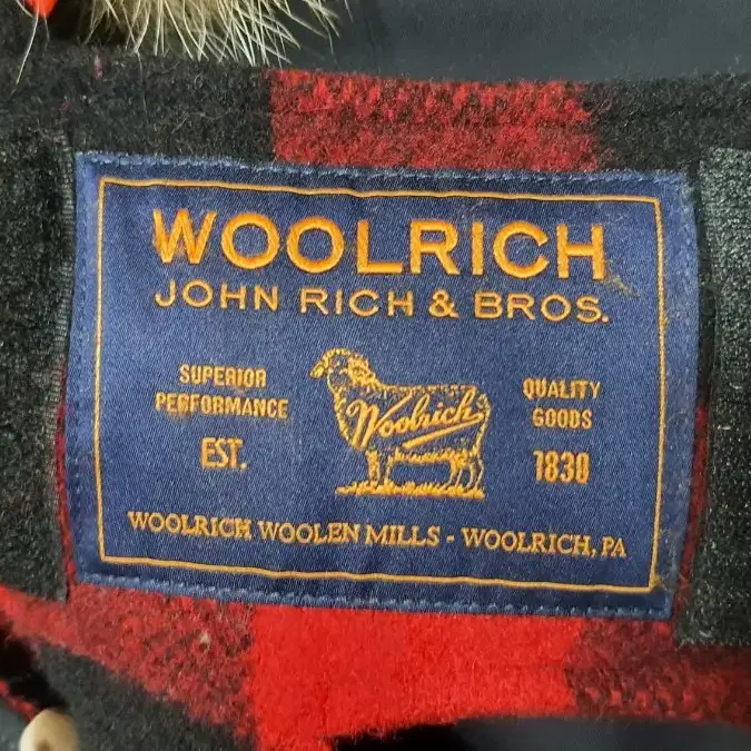 [WOOLRICH] 울리치x그리핀콜라보 리버서블 패딩