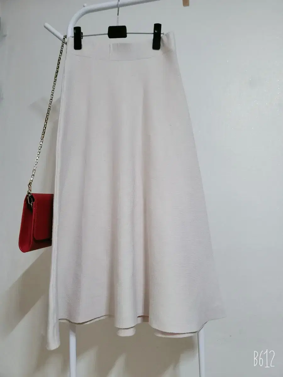 Knit flared long skirt with waistband