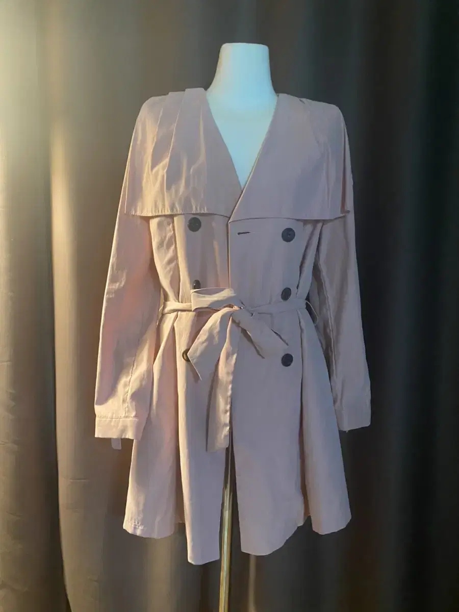 An innocent indigo-pink trench coat