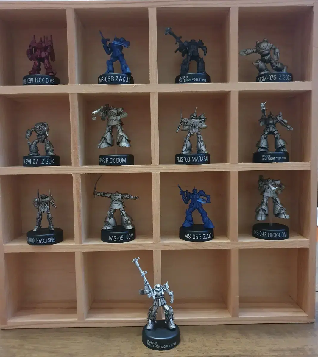 26 Gundam miniatures for sale.