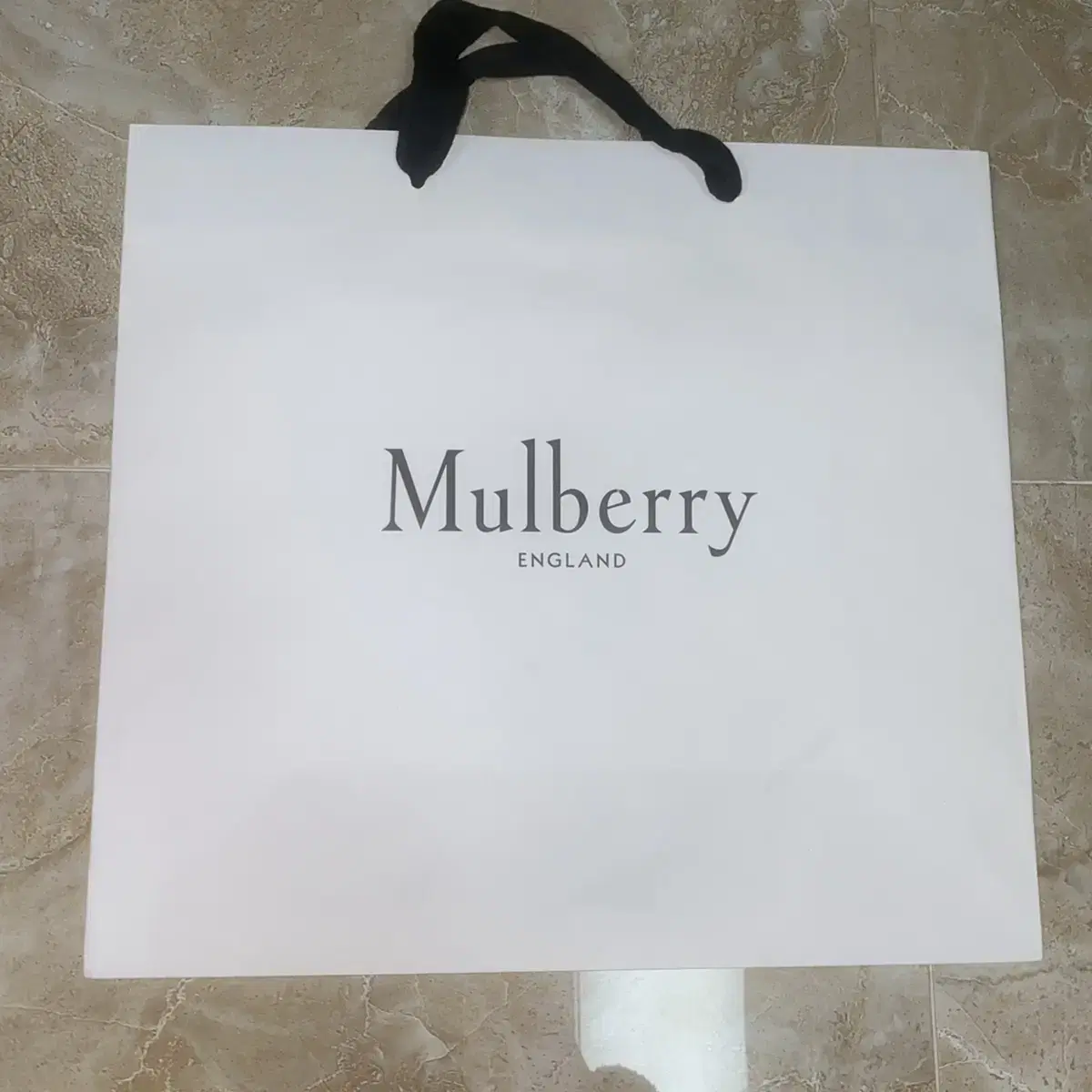 Mulberry sells shopping bags