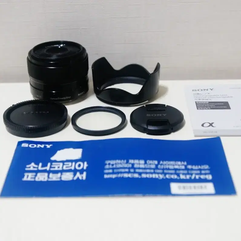 [소니] SEL 35mm f1.8 카페렌즈팝니다.(31만원)