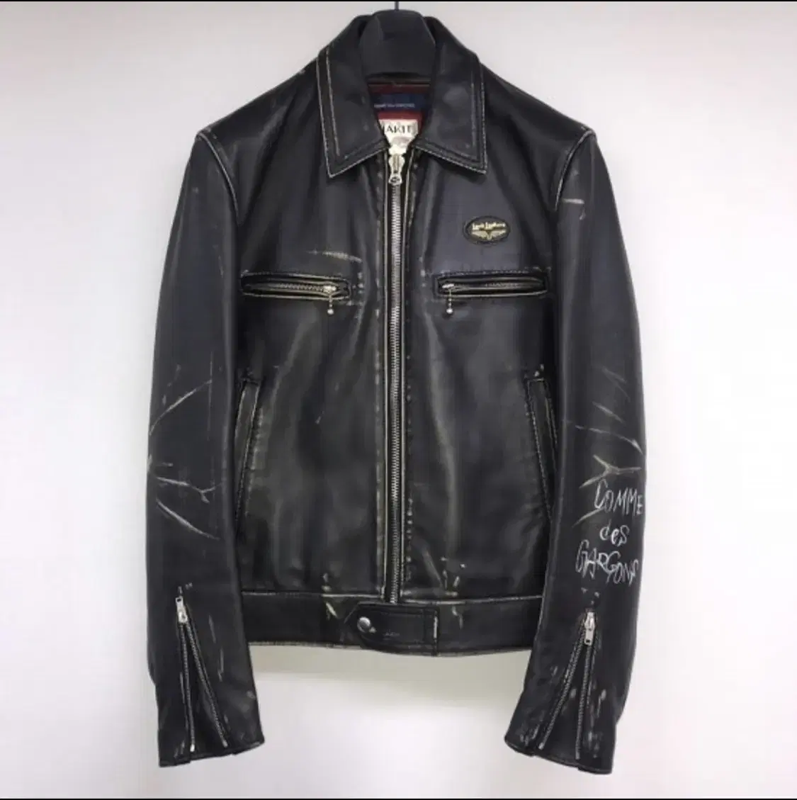 Comme des Garçons Song x Lewis Leather Sale