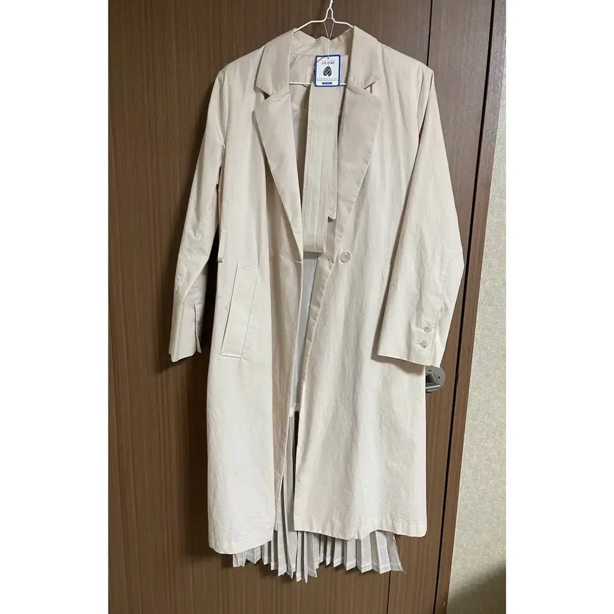 Ruffled trench coat